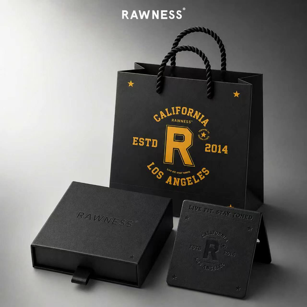 RAWNESS premium black jewelry packaging set with branded bag, presentation box, and display card